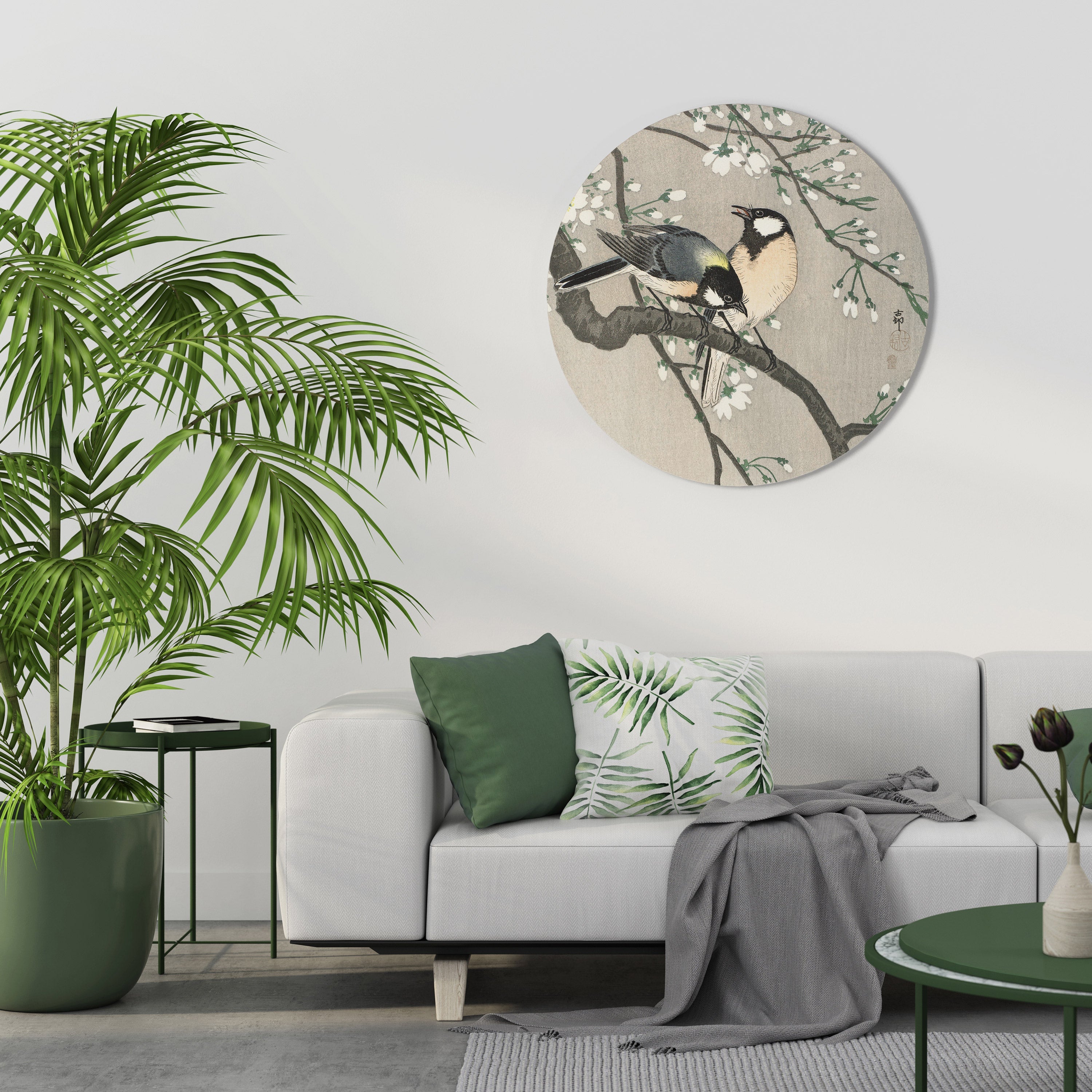 Décoration murale ronde avec des mésanges sur une branche de cerisier